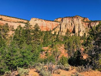 Scenic view of rocky mountains against clear sky