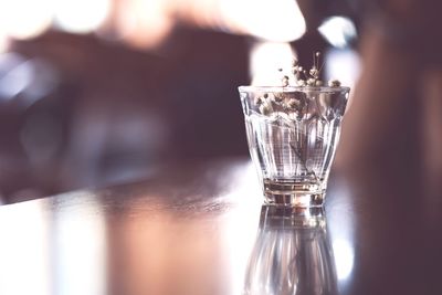 Close-up of wine glass on table