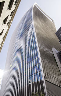 Low angle view of modern building against sky