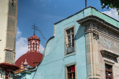 Low angle view of traditional building against sky