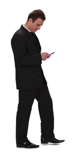 Young man standing against white background