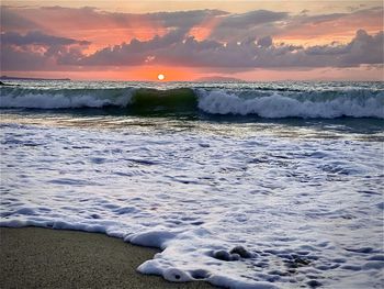 Scenic view of sea against sky during sunset