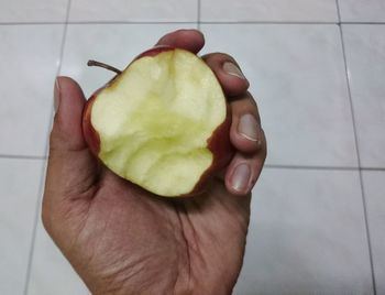 Close-up of man hand holding fruit