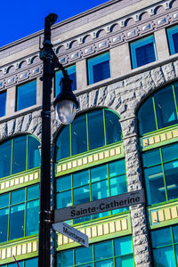 Low angle view of building against clear blue sky