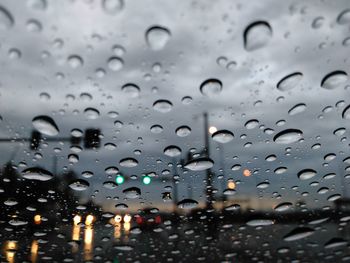 Full frame shot of wet window in rainy season