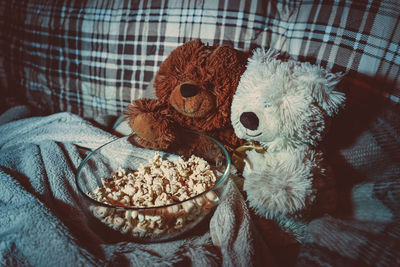 Close-up of stuffed toy on bed