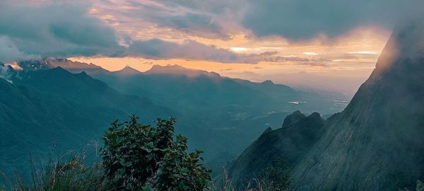 Scenic view of mountains against sky during sunset