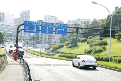 Cars on road in city