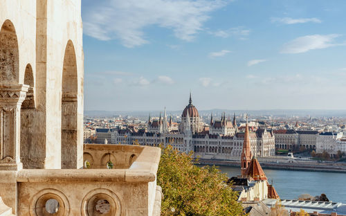 Cityscape of budapest and hungarian parliament on bank of danube river