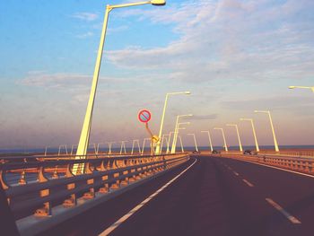 Road against cloudy sky