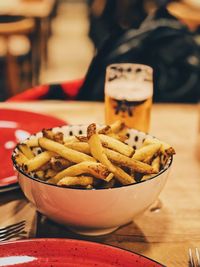 Close-up of burger and fries on table