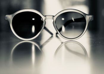 Close-up of sunglasses on table