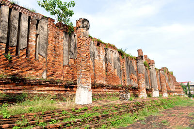 Low angle view of old ruin building against sky