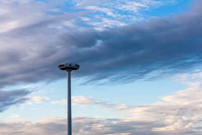 Low angle view of street light against sky