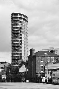 Modern buildings in city against sky