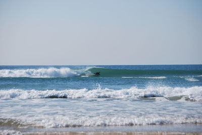 Waves splashing on shore