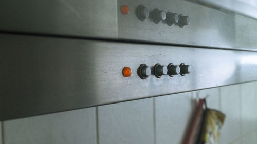 Close-up of objects on wall