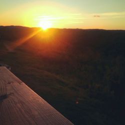 Sun shining over landscape