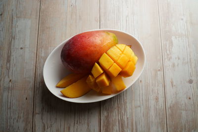 High angle view of fruits in bowl on table