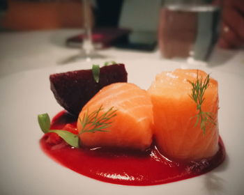 Close-up of serving slices in plate on table