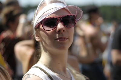 Portrait of young woman wearing sunglasses