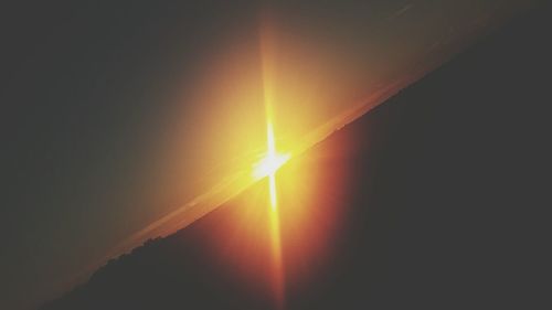 Sun shining through clouds