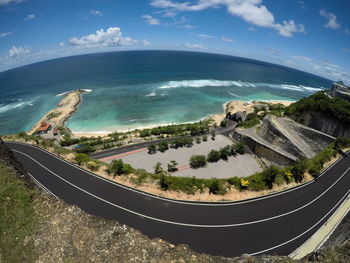 High angle view of swimming pool by sea against sky