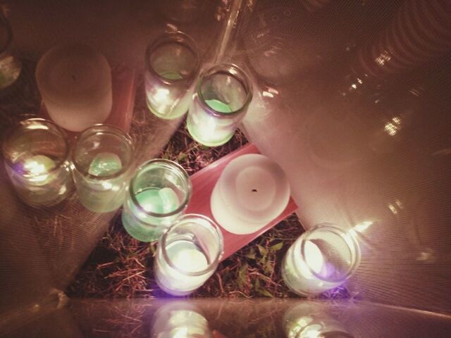 indoors, still life, close-up, table, high angle view, glass - material, food and drink, drink, refreshment, freshness, drinking glass, variation, transparent, no people, multi colored, large group of objects, bottle, container, pink color, glass