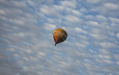 Low angle view of a hot air balloon against sky