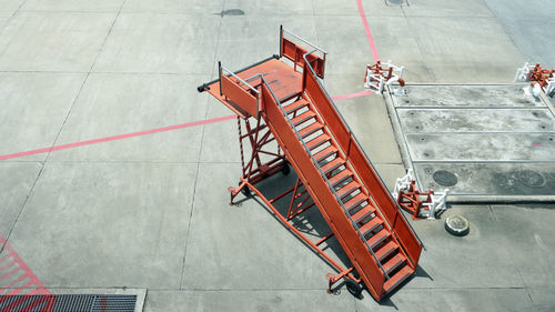 High angle view of red staircase at airport