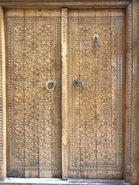 Close-up of closed door of old building