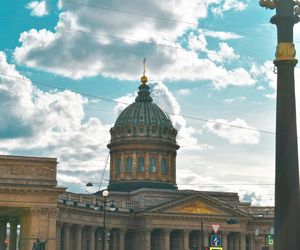 Low angle view of church against cloudy sky