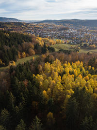 High angle view of trees and landscape against sky