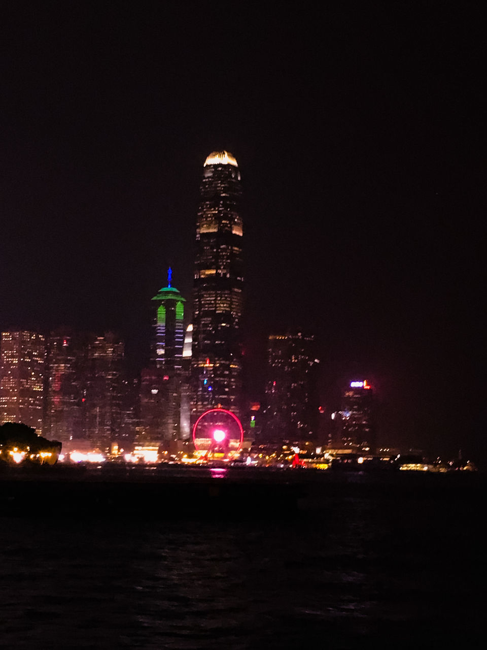 VIEW OF ILLUMINATED BUILDINGS AT NIGHT