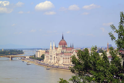 View of cathedral in city against sky