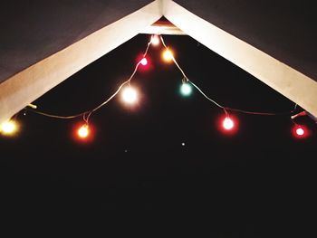 Close-up of illuminated lights at night