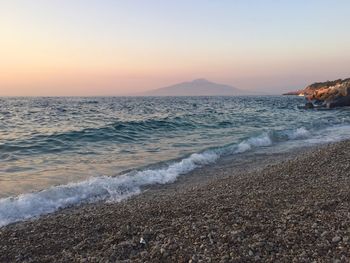 Scenic view of sea against sky during sunset