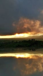 Scenic view of dramatic sky during sunset