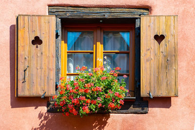 Closed window of abandoned house