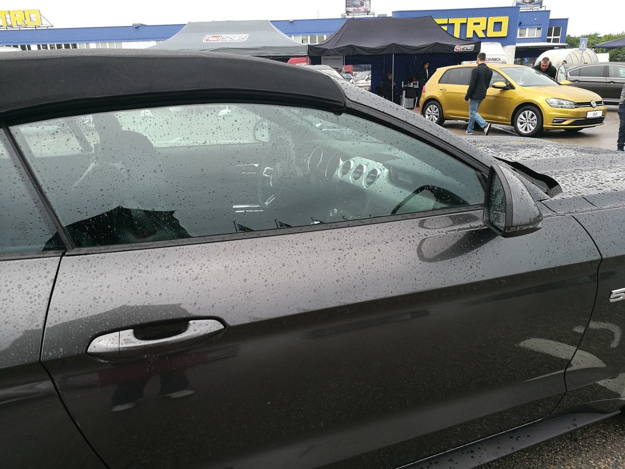 CAR ON WET STREET