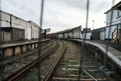 Railway tracks against sky