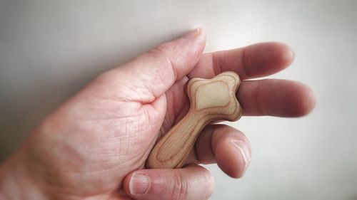 Close-up of hand holding hands