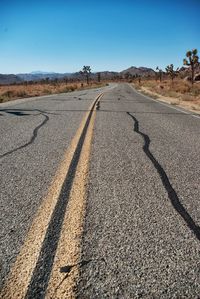 Road on landscape against clear sky