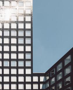 Low angle view of buildings against clear sky