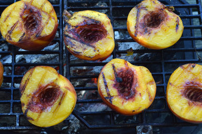 Close-up of fruits on barbecue grill