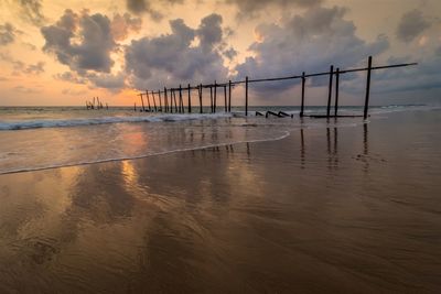 Scenic view of sea against sky at sunset