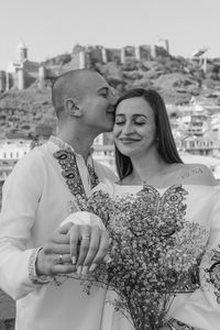 Portrait of smiling couple holding hands