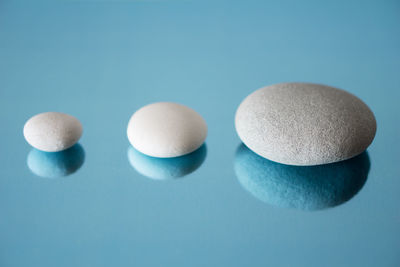 Close-up of medicines over blue background