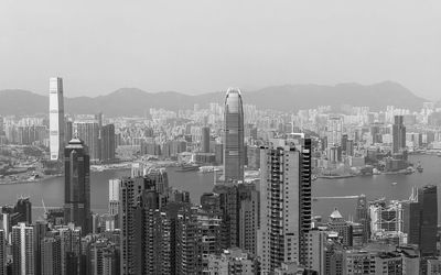 Aerial view of modern buildings in city against sky