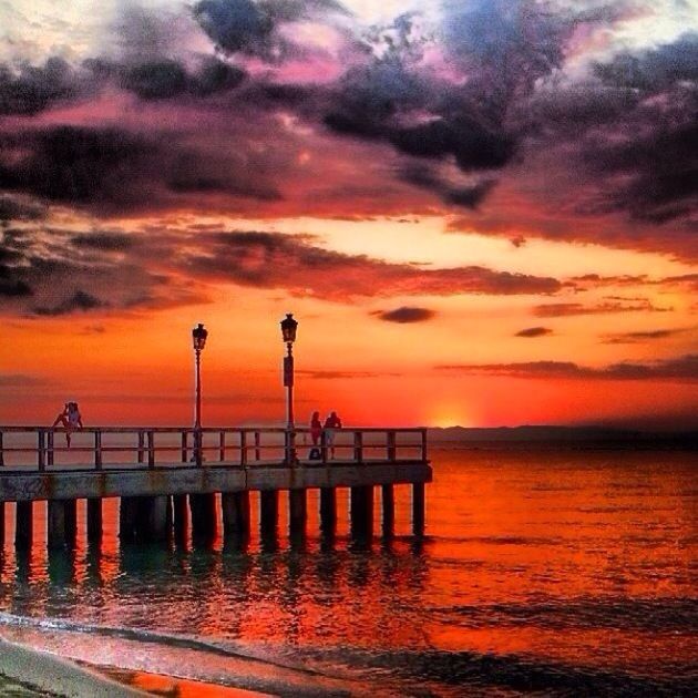 sunset, water, sea, sky, orange color, scenics, beauty in nature, pier, tranquil scene, tranquility, cloud - sky, horizon over water, idyllic, dramatic sky, nature, silhouette, reflection, cloudy, cloud, waterfront